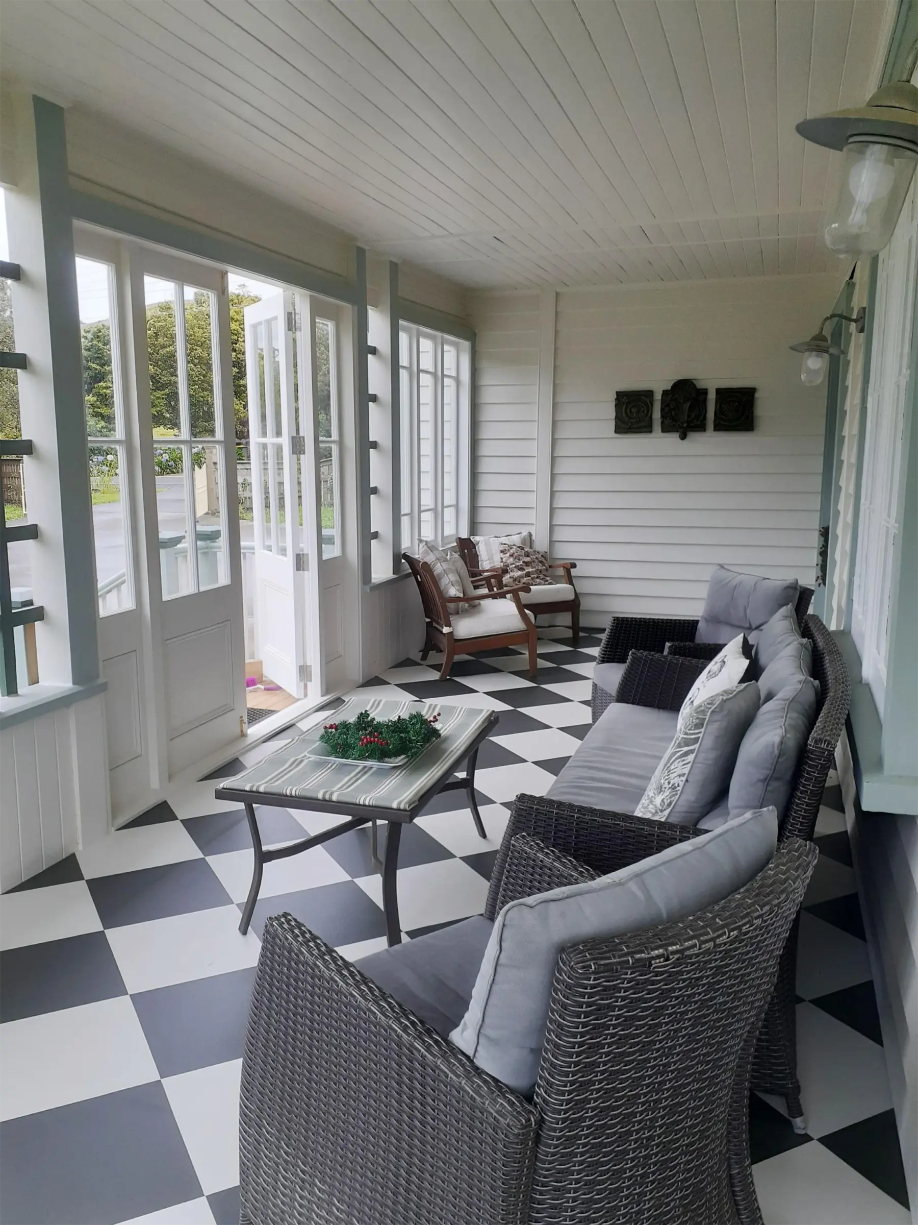 Finished conservatory with checkerboard floor